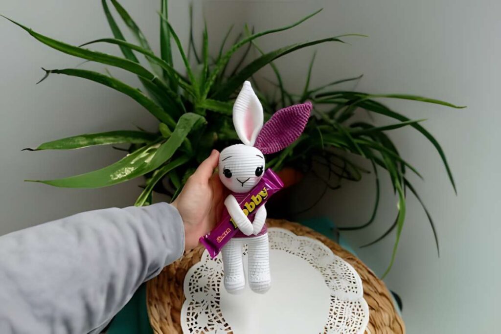 Amigurumi crochet patterns featuring a cute bunny with purple wings.